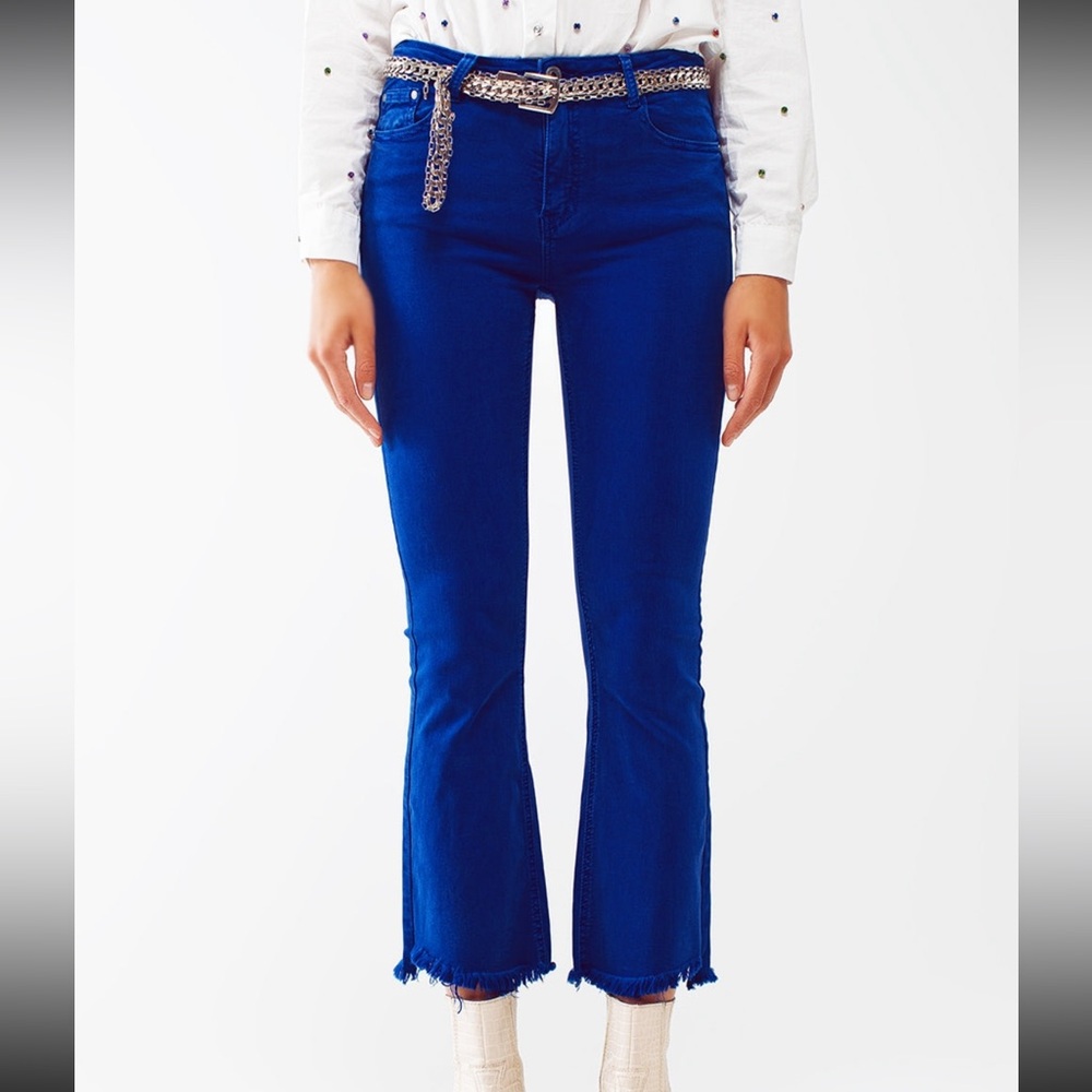 New w tags. Royal blue jeans. Kick flare raw hem. Stretch. Multiple sizes
